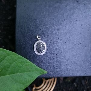 Black and white diamond pendant
